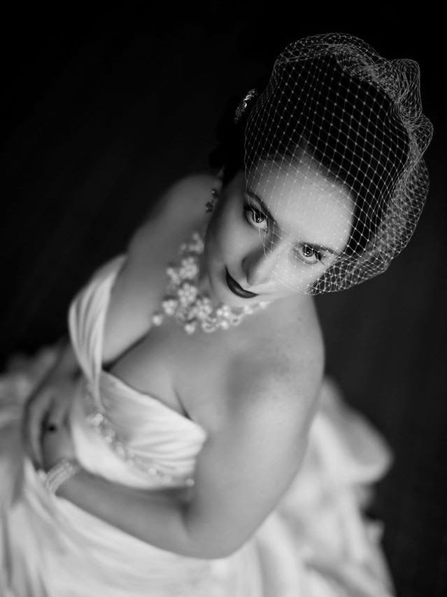 Bridal makeup with birdcage veil